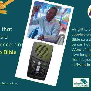 An e-card on a dark green background, with text on the left that says: 'A gift that makes a difference: an Audio Bible’ To the right are 2 photos: a close-up photo of a solar-powered audio Bible (which looks like a small mobile phone); a smiling young Rwandan man holding an Audio Bible up in the air, as he sits in a wheelchair. Below the images is text saying: 'My gift to you supplies an Audio Bible so a disabled person hears the Word of life in their own language - like this young man in Rwanda. There are logos for Through the Roof www.throughtheroof.org and their project Wheels for the World. There is also a QR code linking to their International Missions page at https://throughtheroof.org/international-mission/