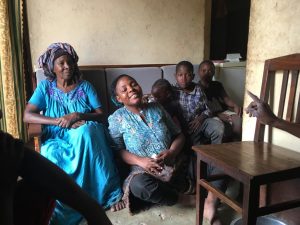 A family with two adult women and three children, hoping for a wheelchair