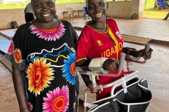Two people smiling - one is in their new fitted walker