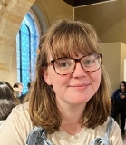 Triona-Brading_2024: Young woman with glasses and shoulder-length fair hair.