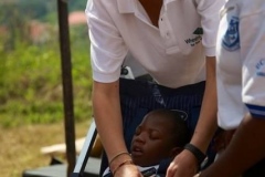 1_child-in-buggy-with-wheels-team-member-uganda-2012