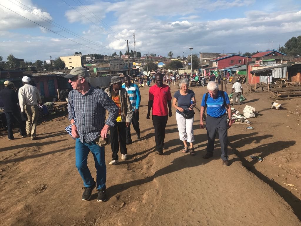 The team walking through town