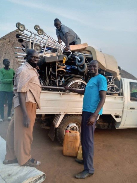 A pick up truck fully loaded with wheelchairs
