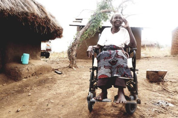 Shifrah sits in her new wheelchair