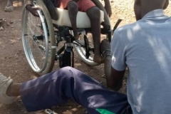 Cosmas in her new wheelchair